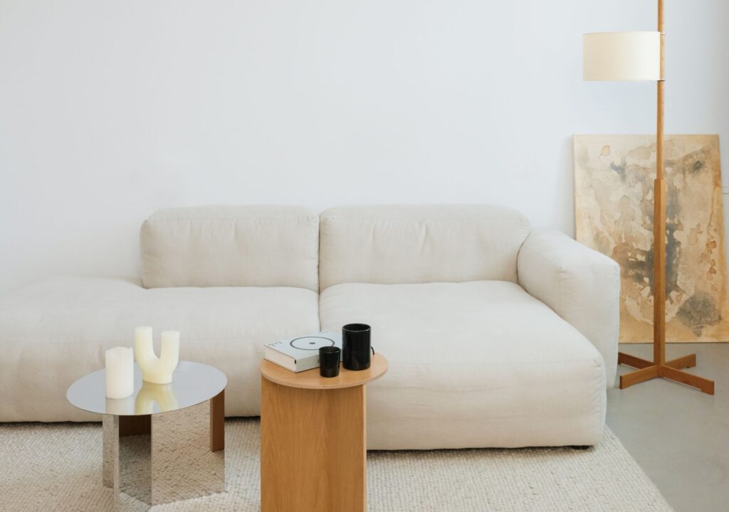 living room with a clean sofa and cozy décor, representing result of cleaning services in Jersey City