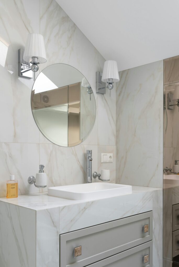 Modern bathroom with a white vanity. Cleaned to perfection by Soul Cleaners