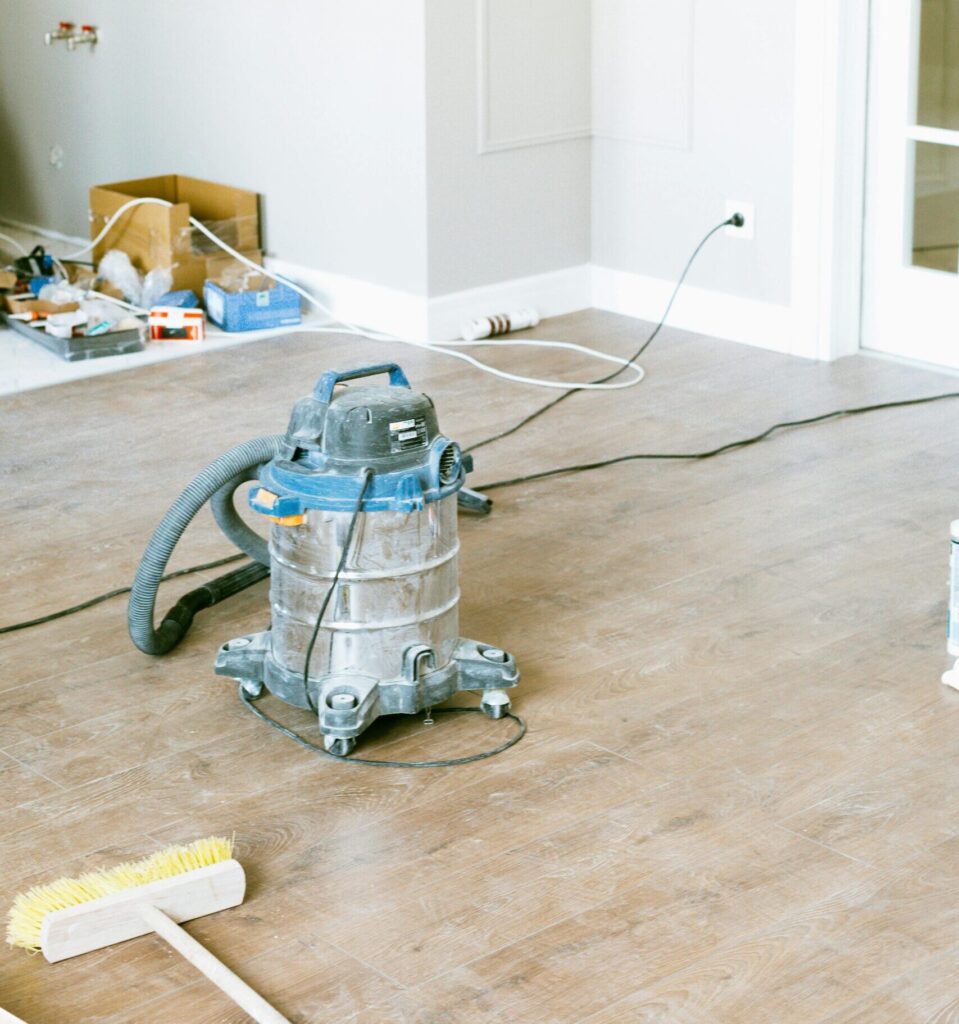 Industrial vacuum in a dust-covered room. The best post-construction cleaning in Denver | Post-Construction Cleaning Services in New Jersey