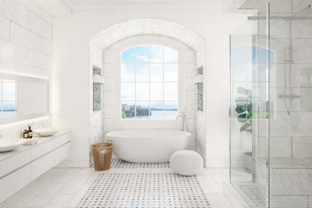 Luxury bathroom with spotless tiles, tub, and mirrors maintained by professional apartment cleaning services in New Jersey